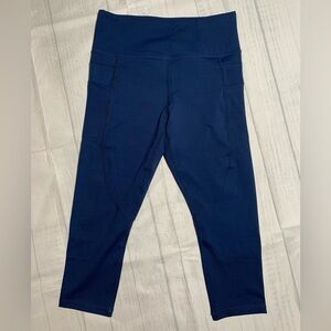 NWOT Zyia blue crop leggings. Size 8-10. (L).